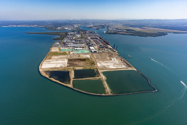 Aerial view of the Port of Brisbane with Brisbane in the background